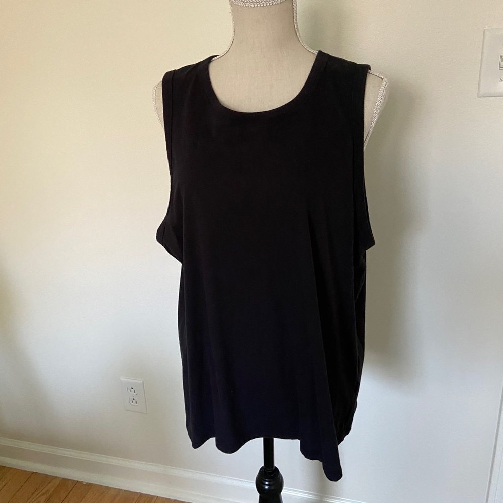 Sleeveless top.  Runs small.  Also available in pink and gray.